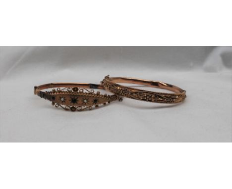 A 9ct yellow gold bangle set with sapphires and pearls together with a 9ct yellow gold hinged bangle, approximately 14 grams