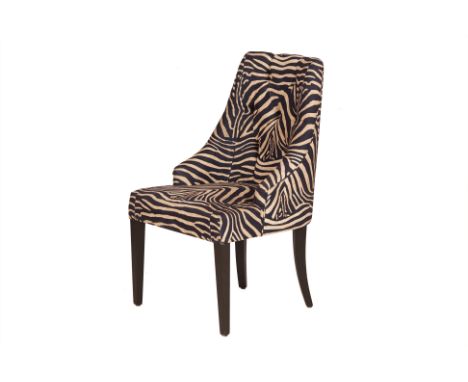 A ZEBRA PRINT UPHOLSTERED CHAIR
With button backed seat and square tapering legs
100cm x 58cm x 51cm
Condition: Signs of wear