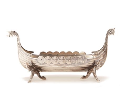 A NORWEGIAN SILVER VIKING BOAT SHAPED BOWL
Mark of Marius Hammer, Bergen, 830 standard
9cm high x 18cm wide x 5.5cm deep
112g