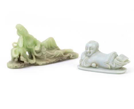 TWO JADE CARVINGS
A reclining figure of Guanyin, bears a seal mark to base; and another of a boy
30cm and 20cm long respectiv