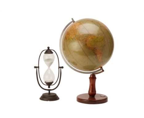 AN ADLER ERDGLOBUS ROTATING GLOBE AND A SAND TIMER
The globe on a wooden base with a compass inserted into the base,  and the