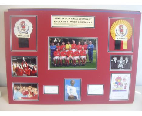 England 1966 World Cup Team Fully Signed Display: Measuring a massive 23 x 33 inches and double mounted in red and blue with 