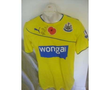 Newcastle United Match Worn Poppy Football Shirt: Yellow rare 3rd shirt worn by Mike Williamson in the away match at Tottenha