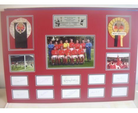 England 1966 World Cup Team Fully Signed Display: Measuring a massive 23 x 33 inches and double mounted in red and blue with 