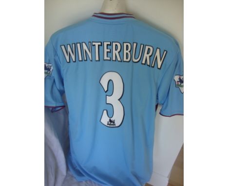 Nigel Winterburn Match Worn West Ham Football Shirt: Light blue short sleeve away shirt Fila DR Martens from early 2000s with