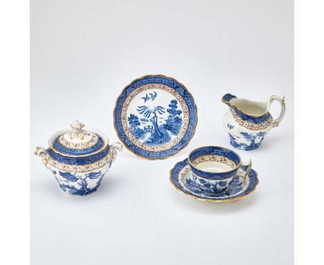 Comprising eighteen small dessert plates, diameter 6 1/4 inches; eighteen tea cups; eighteen saucers; a two-handled covered s