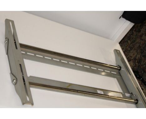 A metal wall mounted TV bracket (For 42 inch TV's plus) 