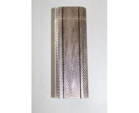 A quality vintage silver tone Cartier lighter 