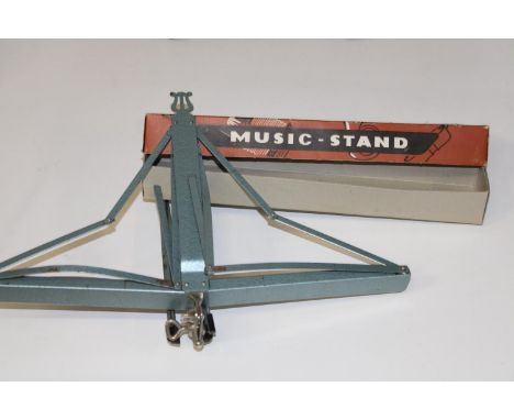 A boxed vintage music stand 