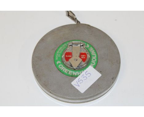 A vintage Rathbone metal 100ft tape 