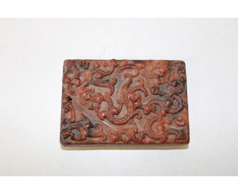 A 19th century Chinese jade tablet caved to both sides 