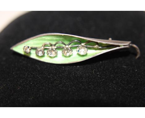 A stylish silver &amp; enamel brooch 