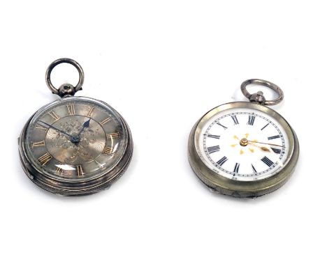 An Edward VII silver fob watch, the outer case with engine turned decoration and vacant shield, key wind, with a silver Roman