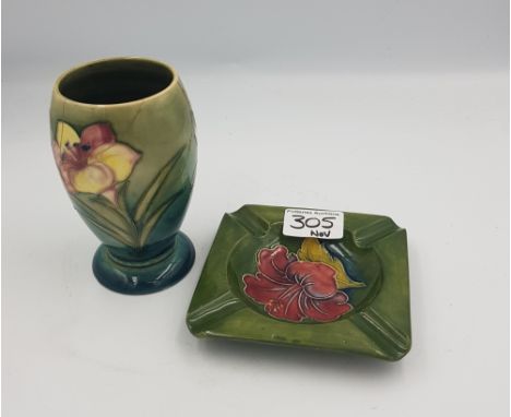 Moorcroft Hibiscus pattern on green ground square ashtray together with a spring flowers pattern vase, 12cm in height, (exten