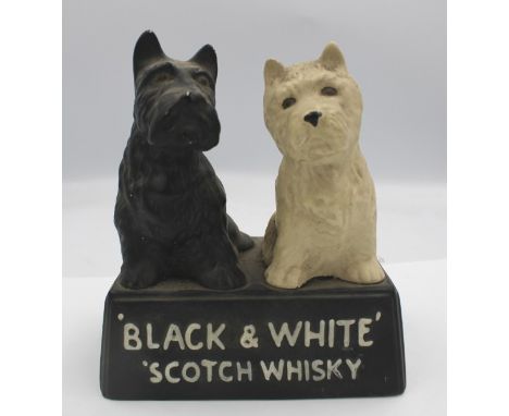Black &amp; White Scotch Whisky ceramic advertising figure. 