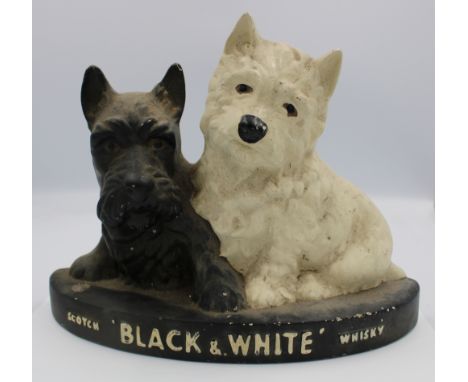 A Black &amp; White Brentleigh Ware Scotch Whisky ceramic advertising figure. 