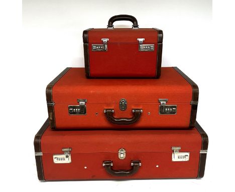 A matching set of 3 vintage style Prada Mandarino Valigie Canapa canvas and leather mounted cases with certificate of authent