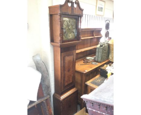 A brass faced longcase clock by John Martyn of Northampton, approx 207cm. Shipping category D.