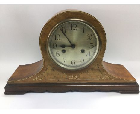 An inlaid walnut eight day mantle clock, approx height 26cm. Shipping category D.