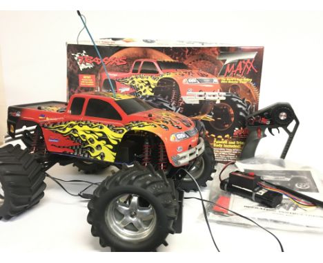 Vintage Traxxas TMax Nitro RC Truck with original box, Manual and controller. Model number 4910. Not tested