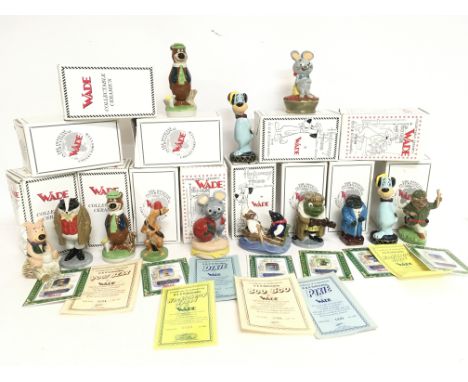 A collection of boxed Wade ceramic figures including Yogi Bear, Huckleberry Hound, Boo Boo, Pixie & Dixie etc. no obvious lar