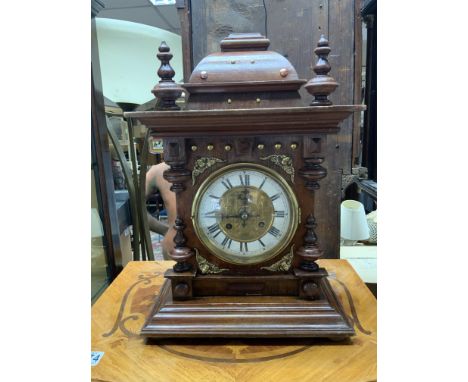 A vintage mantle clock with pressed dial. (D)