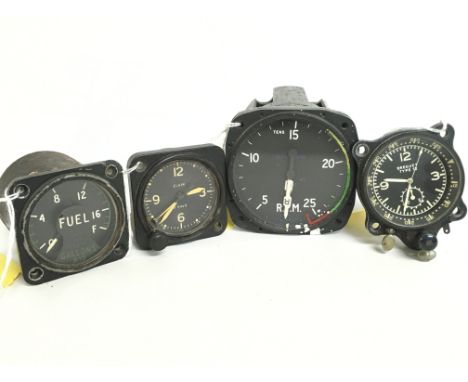 A collection of plane gauges including a Helicopter Tachometer , French Aircraft clock etc.