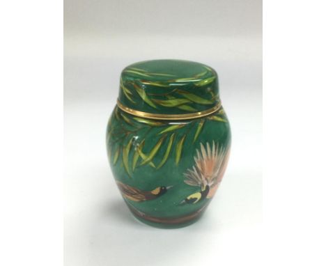 A small boxed limited edition Moorcroft enamel vase and cover decorated with birds, monogrammed and numbered 12/50, approx 7.