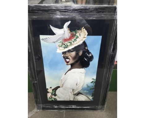 A large framed Grace Jones print. 66cm wide by 92 high, no reserve