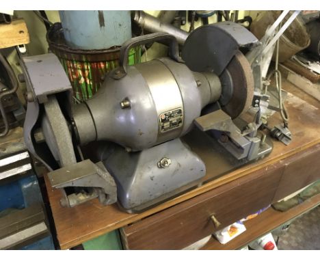A bench top double wheel grinding machine. Viewed by appointment only buyer to collect.