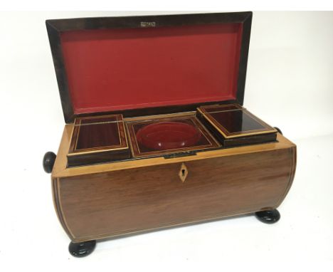 A Quality Early 19th century Rosewood and satinwood tea caddy with a well fitted interior with two compartments. 34cmx18cm