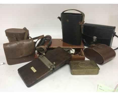 A Mahogany cased set of brass beam balance scales a I world war Christmas tin brushes and binoculars (a lot)