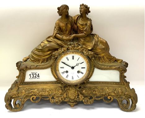 A French Gilt metal and Glass mantle clock, marked for Franjus, A Paris. H.34cm x W. 46cm.