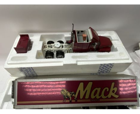 Franklin Mint (1/32nd scale) Mack Articulated Truck & Trailer - finished in black, gold with "Mack " to trailer sides. (D)