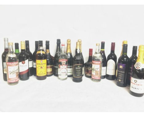 A collection of wines and spirits including Chateau Vernon, Jacobs Creek Tinto, Cava Brut, Dows Fine Tawny Port, Stolichnaya 