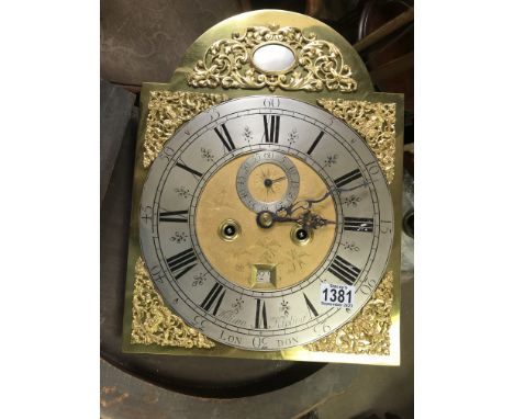 A brass clock movement - William Kipling London.  40cm in height together with one other movement