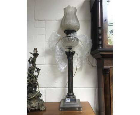 A Victorian silver plated oil lamp with engraved shade, clear glass form- on Corinthian column. Converted to electric.  90 cm