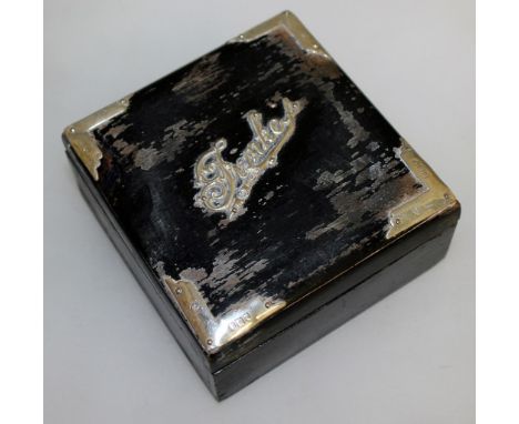 A SILVER MOUNTED LEATHER TRINKET BOX. 8cms x 8cms.  London 1907.