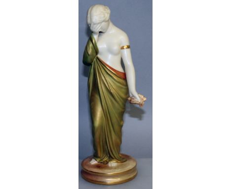 A ROYAL WORCESTER SHOT GOLD FIGURE OF SORROW, green mark.
