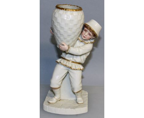 A LATE 19TH CENTURY ROYAL WORCESTER FIGURE OF A BOY carrying a basket, puce mark.