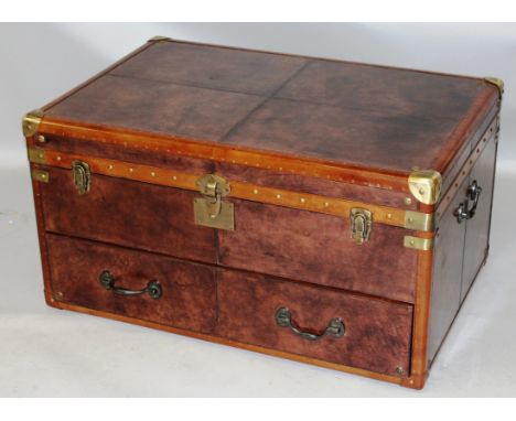A GOOD LARGE BRASS BOUND LEATHER TRUNK with drawer below. 3ft 0ins long x 2ft 0ins deep x 1ft 7ins high.