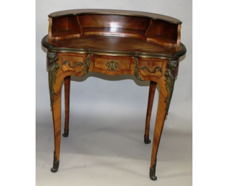 A GOOD LATE 19TH CENTURY FRENCH KINGWOOD AND BRASS MOUNTED WRITING DESK of rounded form with a raised shelf to the back, inse