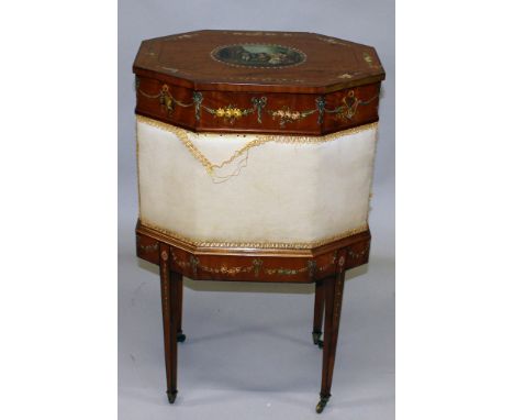 A SHERATON REVIVAL PAINTED SATINWOOD OCTAGONAL SEWING TABLE, the top painted with an oval panel of children playing, garlands