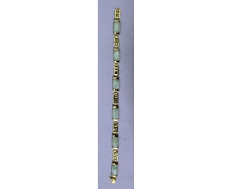 A HIGH GRADE GOLD AND JADE BRACELET set with six rectangular jade stones.