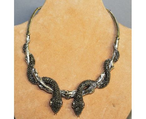 A SILVER RUBY AND MARCASITE SNAKE NECKLACE.