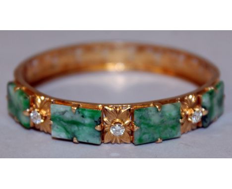 A GOOD HIGH GRADE GOLD, JADE AND DIAMOND BRACELET set with four jade stones and three diamonds.