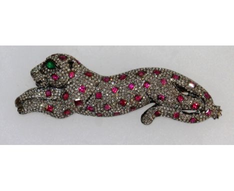 A LARGE RUBY AND DIAMOND SET PANTHER BROOCH.