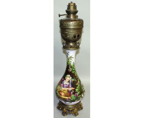 A GOOD VICTORIAN PAINTED GLOBULAR AND ORMOLU OIL LAMP painted with a pretty girl amidst flowers and birds. 26ins high.