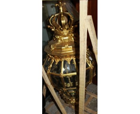 A GOOD LARGE GILT METAL AND GLASS LANTERN with bevelled glass panels. 3ft long.