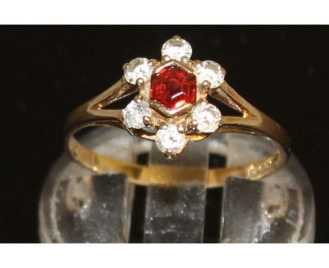 A RUBY AND DIAMOND RING.